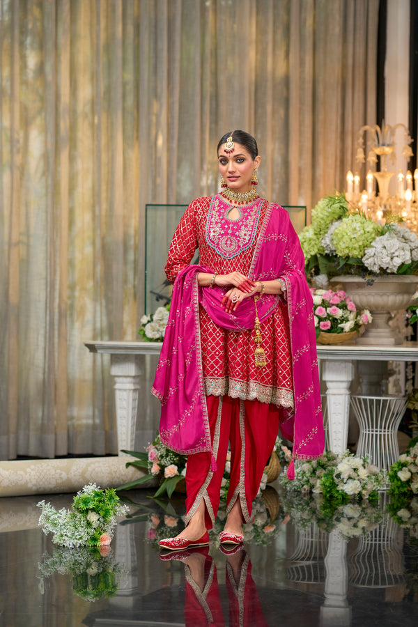 Red kurta and dhoti set with pink dupatta