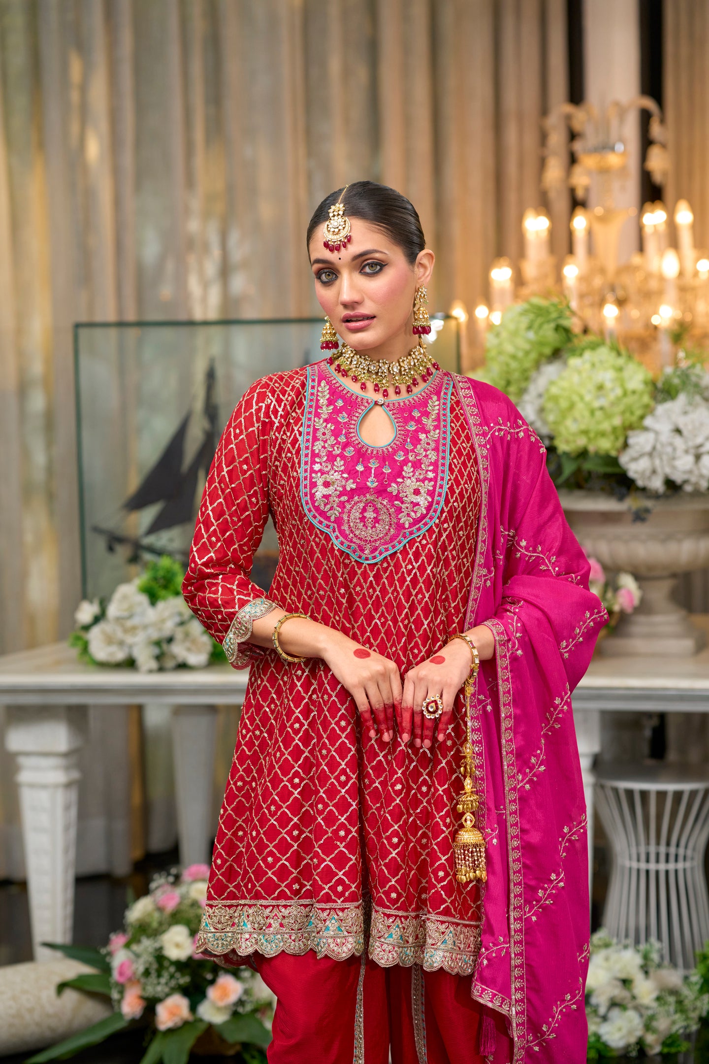 Red kurta and dhoti set with pink dupatta