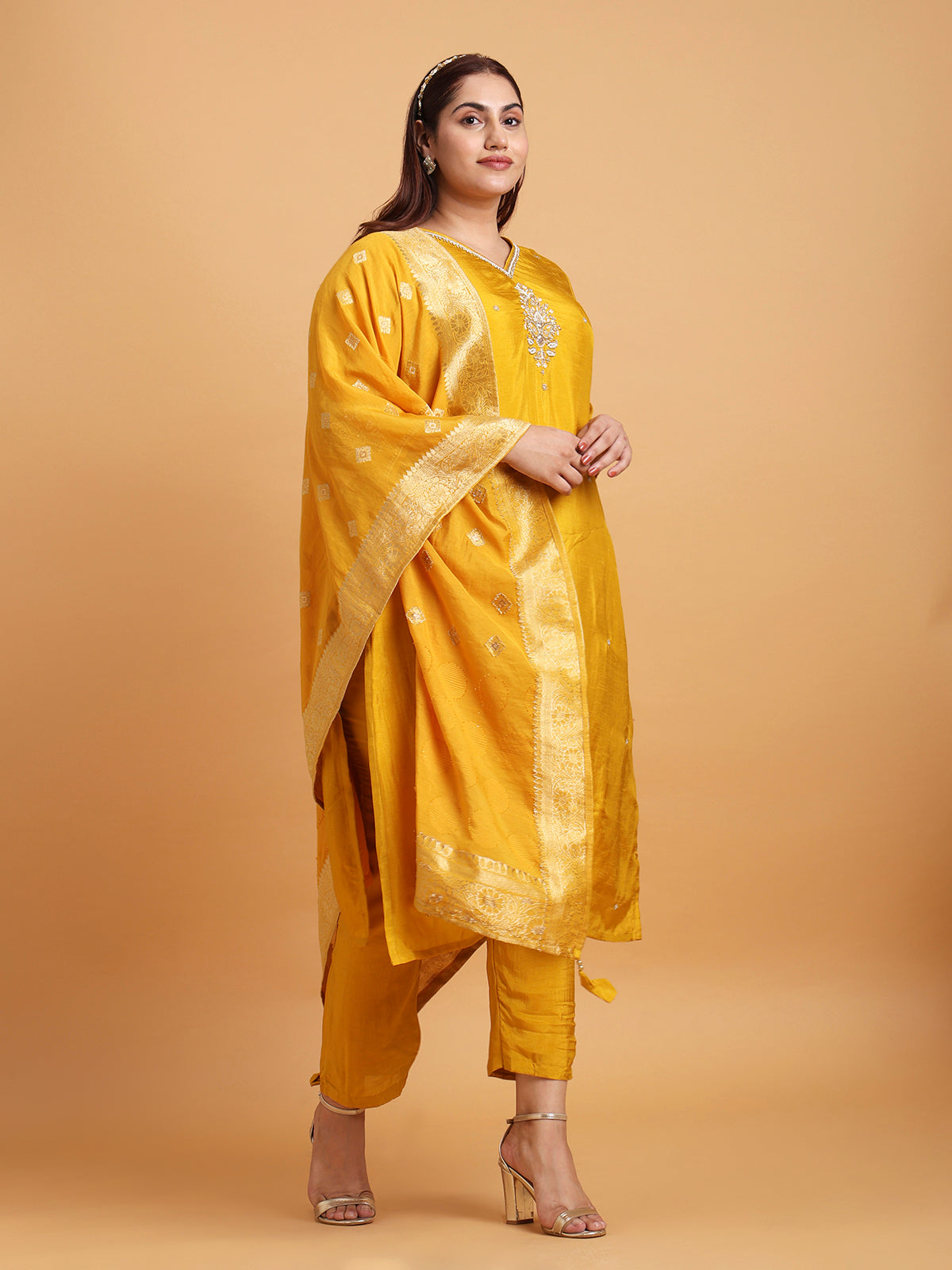 Yellow kurta with yellow woven dupatta and motif