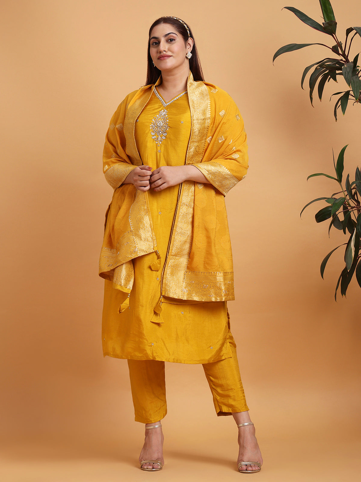 Yellow kurta with yellow woven dupatta and motif