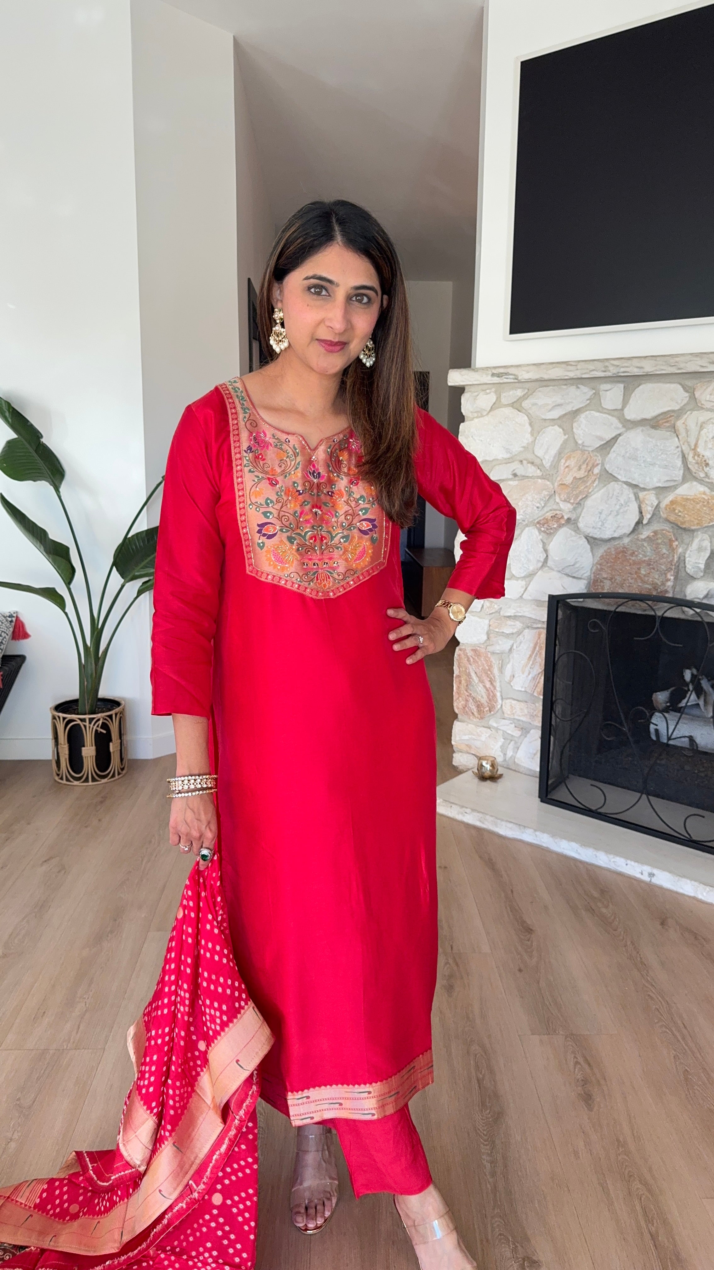 Red paithani silk kurta set with matching dupatta and potli bag