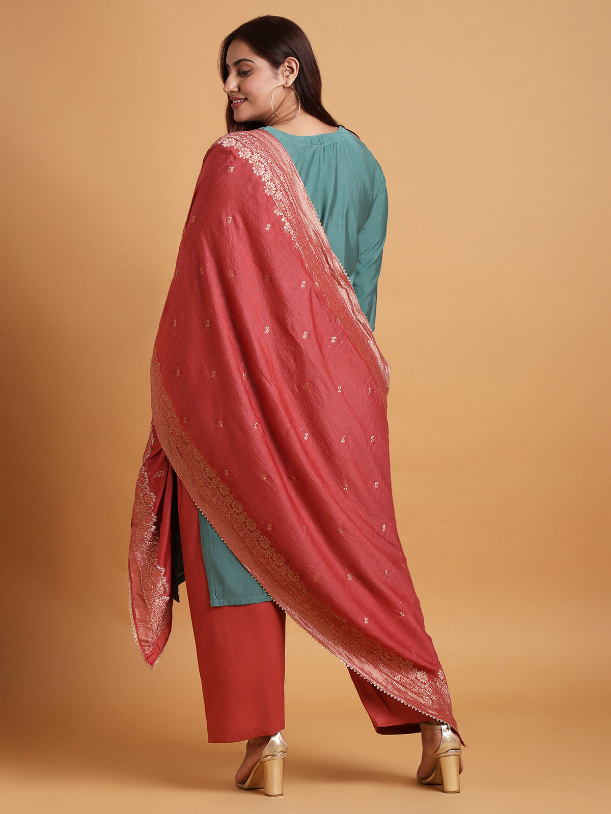 Teal blue kurta set with red and gold dupatta