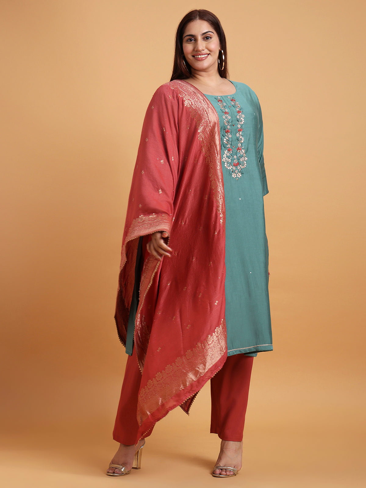 Teal blue kurta set with red and gold dupatta