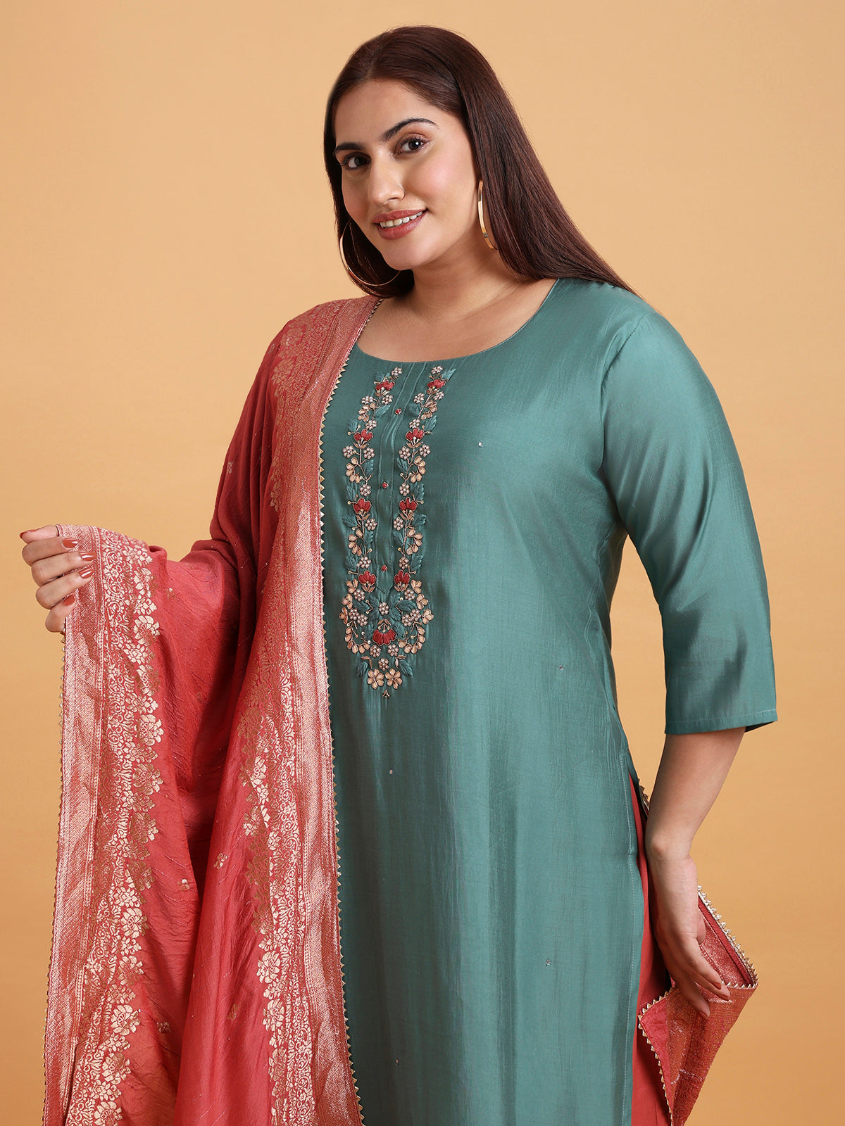 Teal blue kurta set with red and gold dupatta