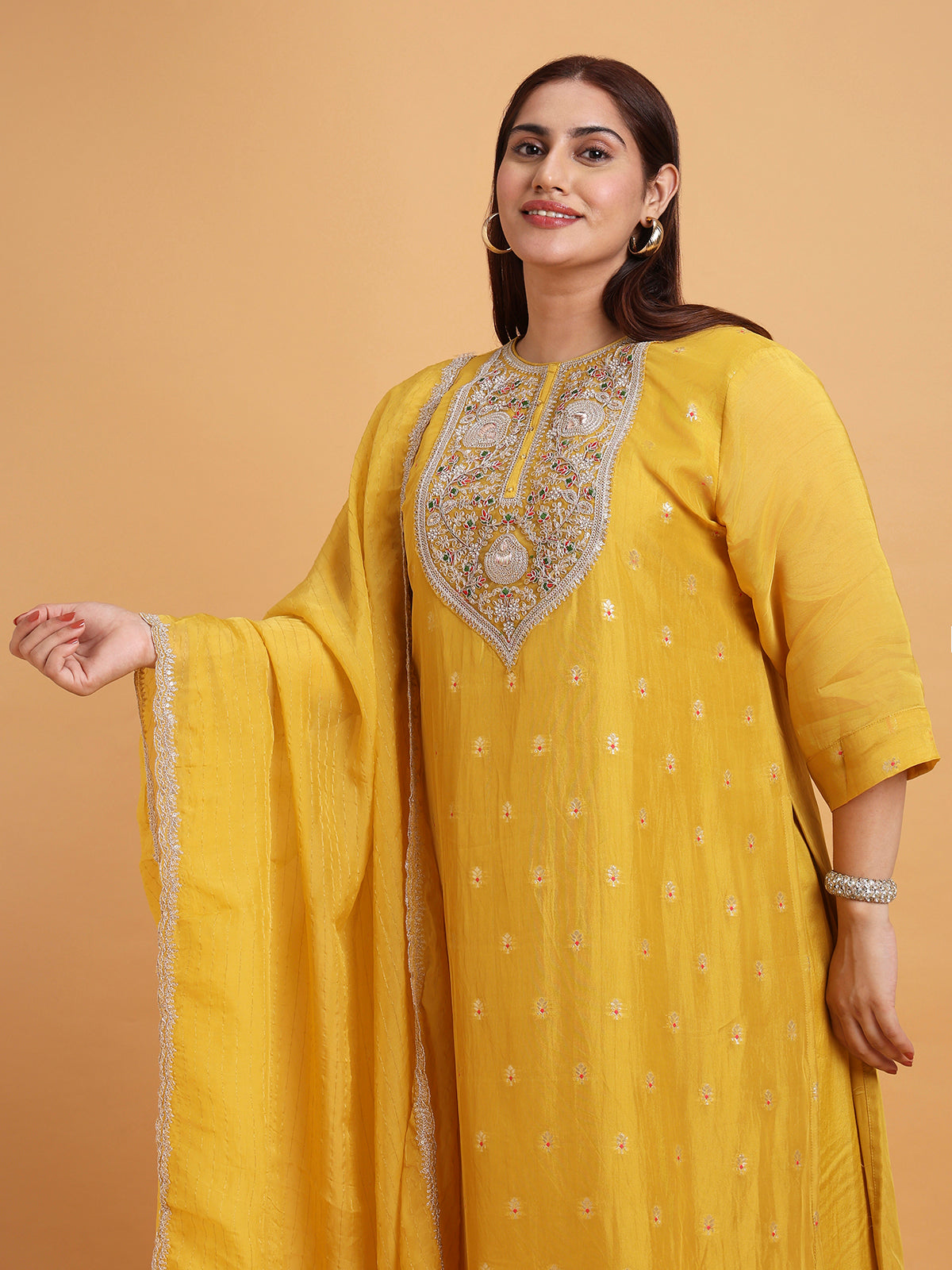 Yellow kurta set with yellow and gold stripe dupatta