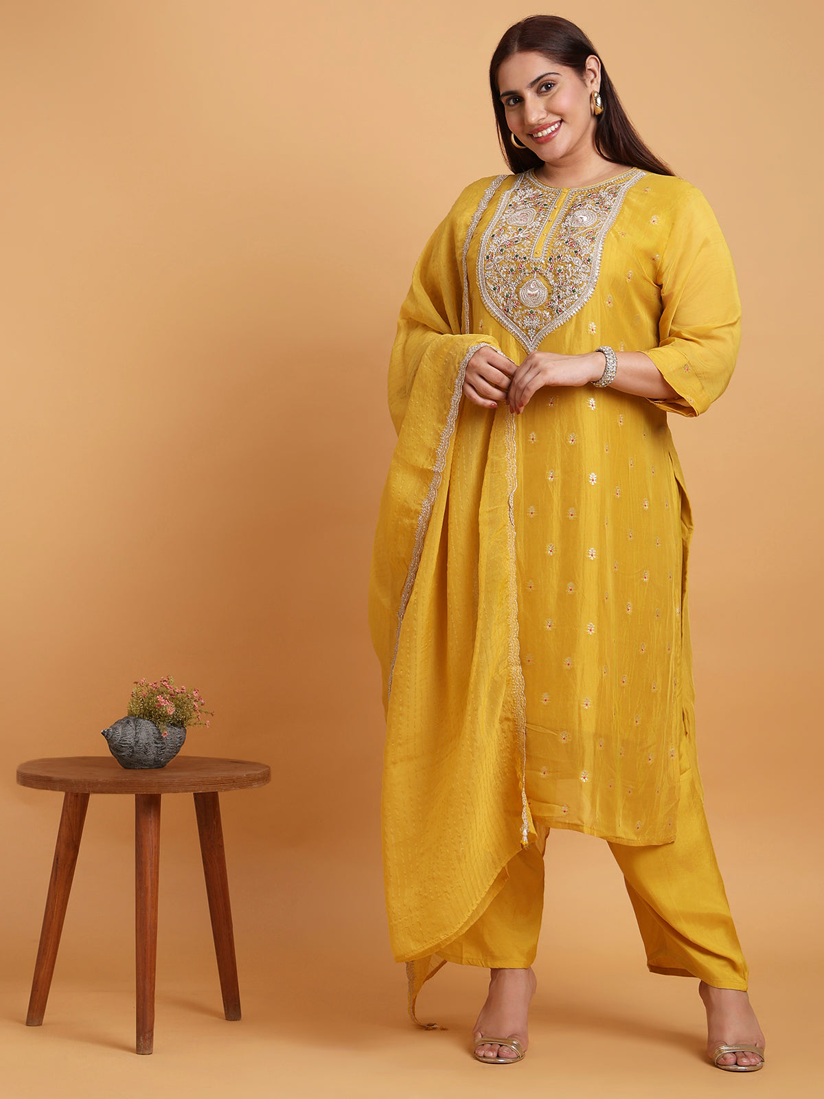 Yellow kurta set with yellow and gold stripe dupatta