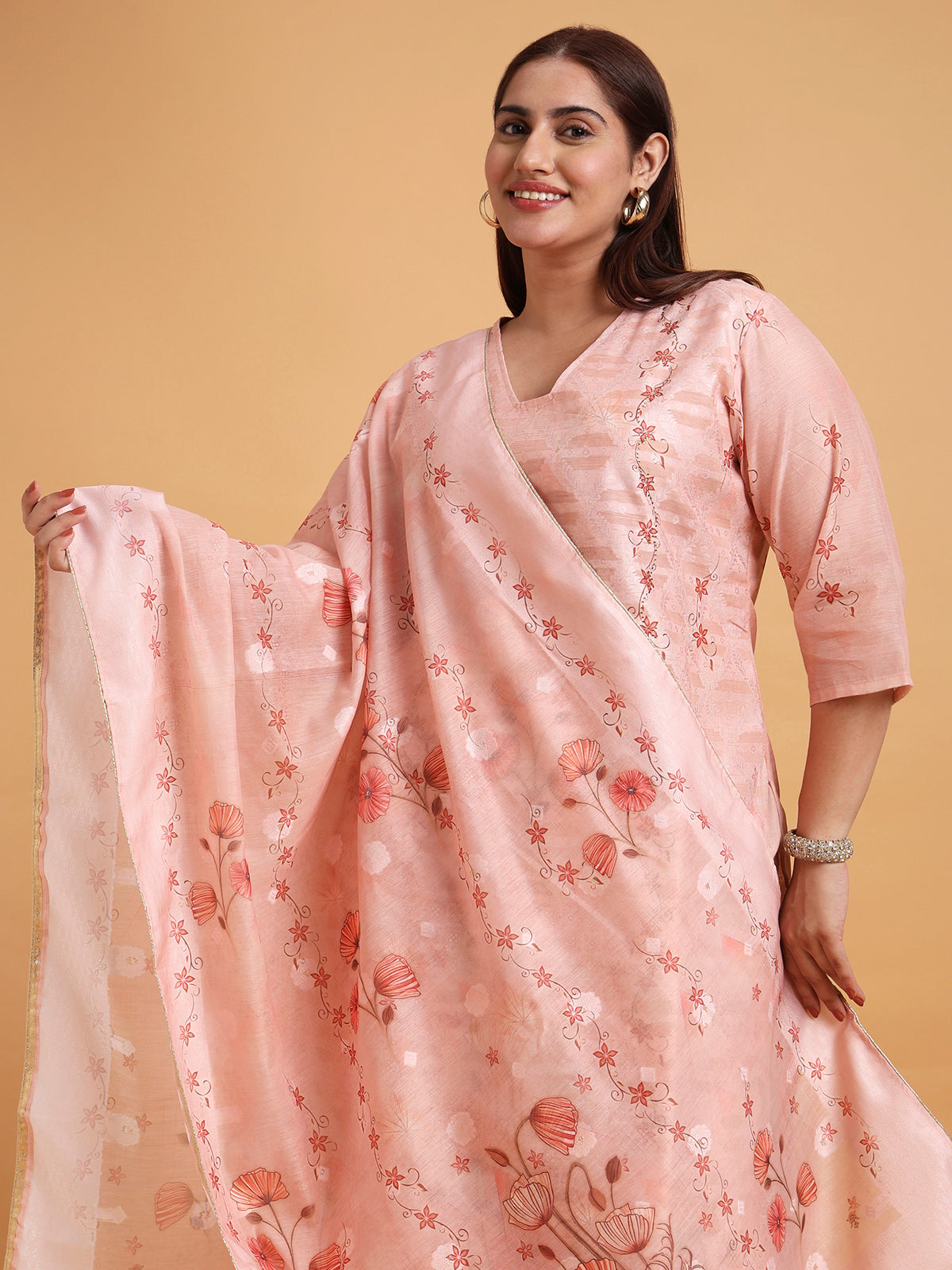 Light peach floral kurta set with floral dupatta