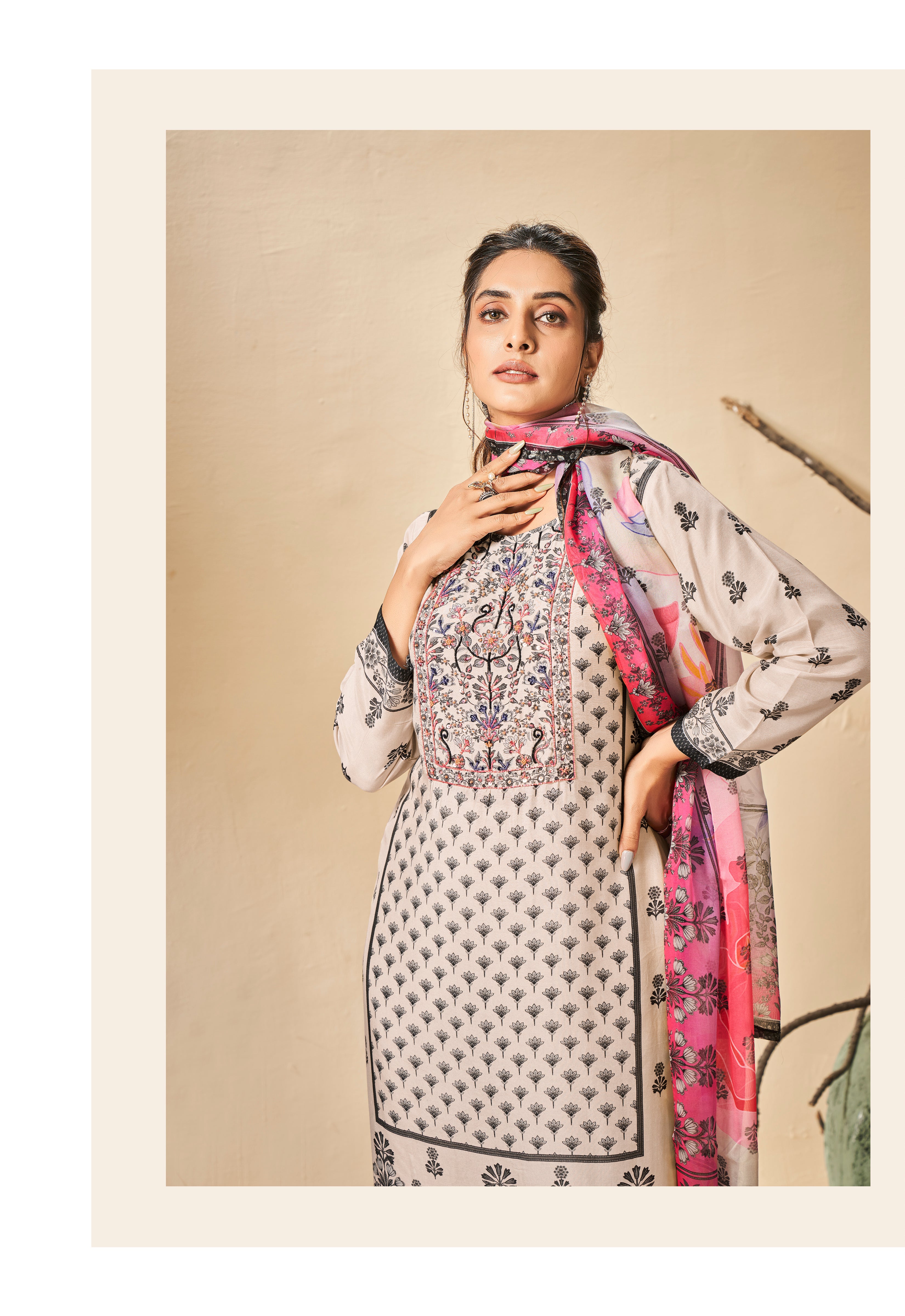 White kurta set with pink printed dupatta