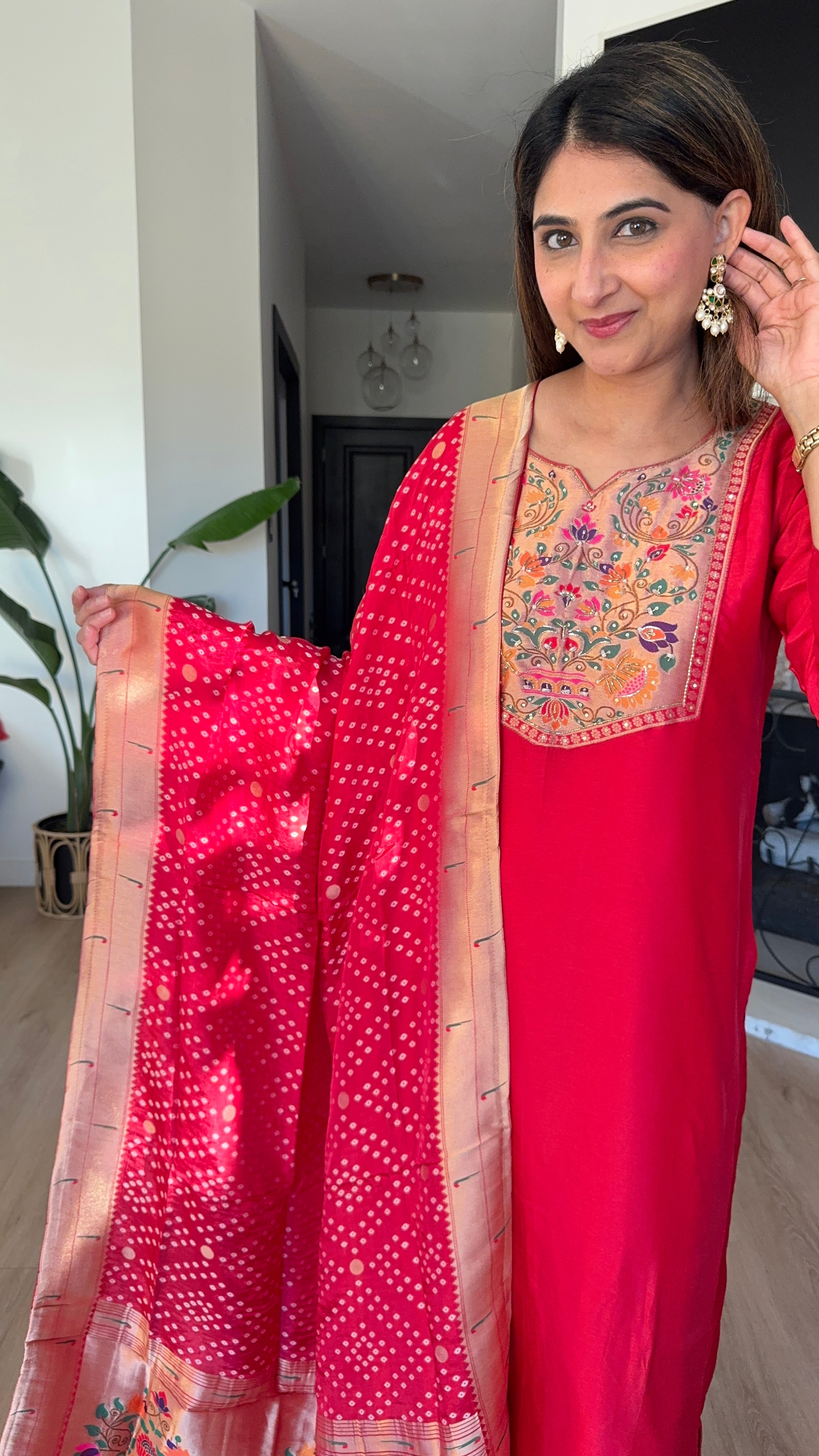 Red paithani silk kurta set with matching dupatta and potli bag