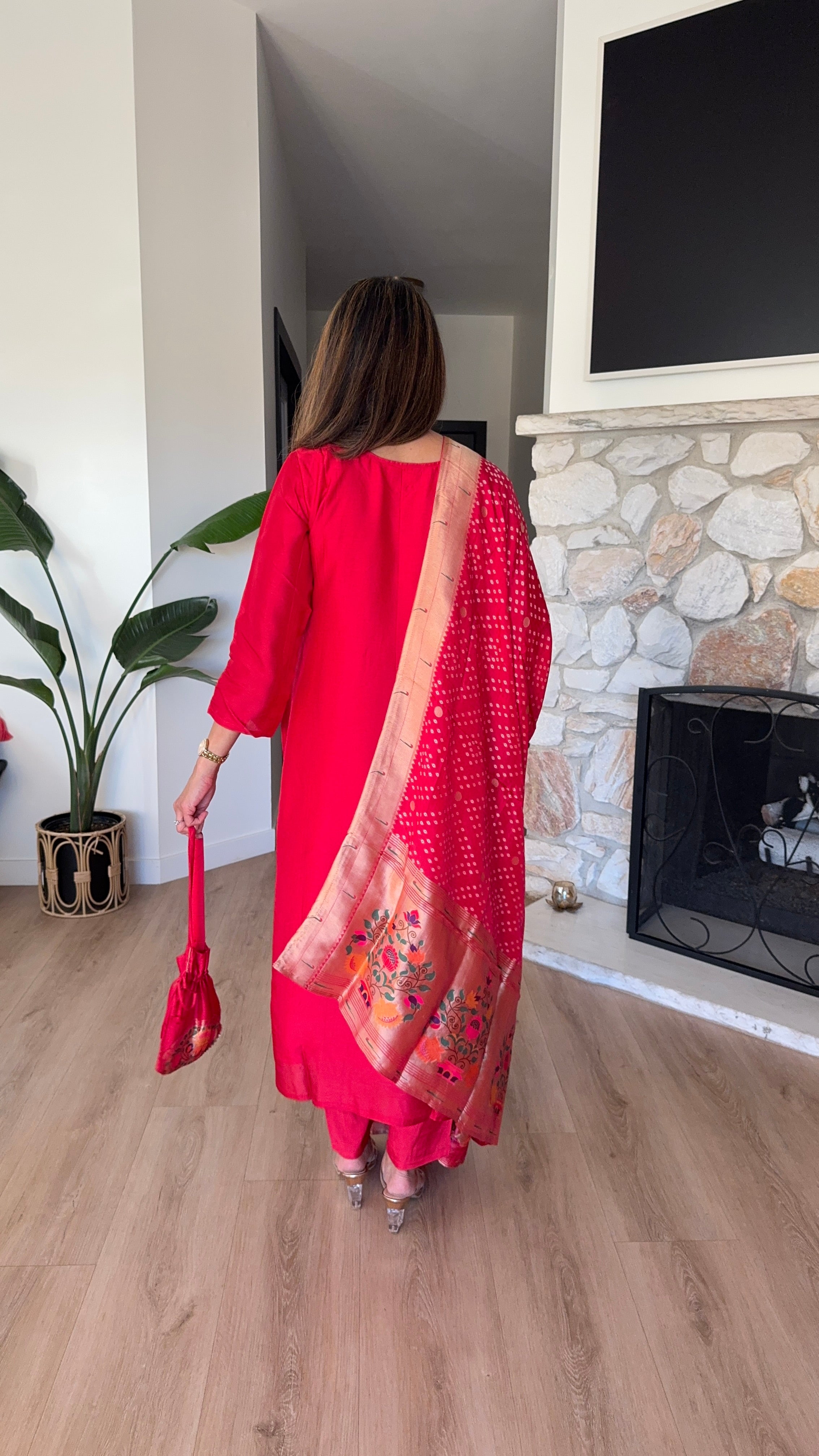 Red paithani silk kurta set with matching dupatta and potli bag