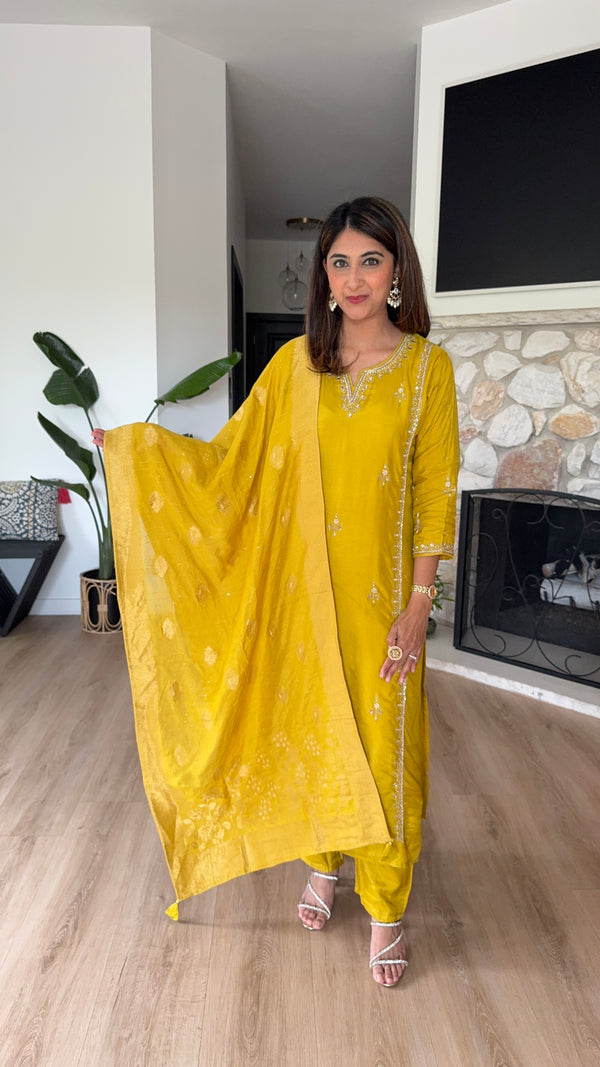 Yellow dola silk kurta set with yellow woven dupatta