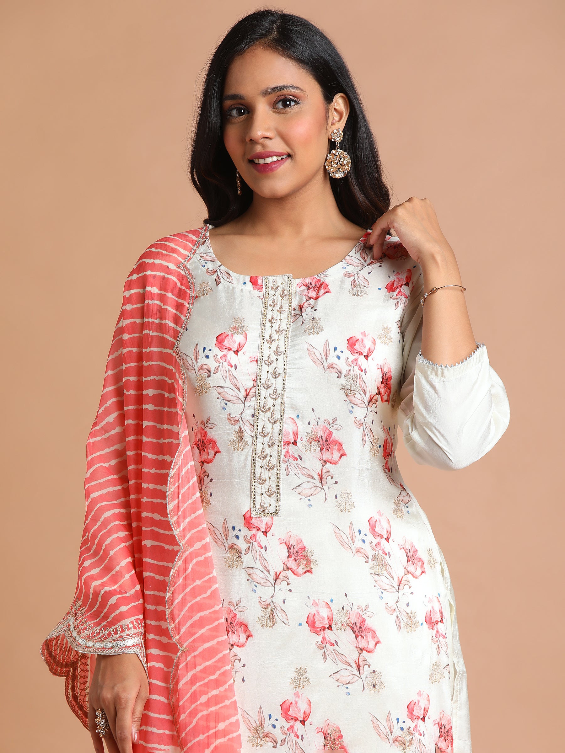 White floral kurta set with red tie dye scallop dupatta