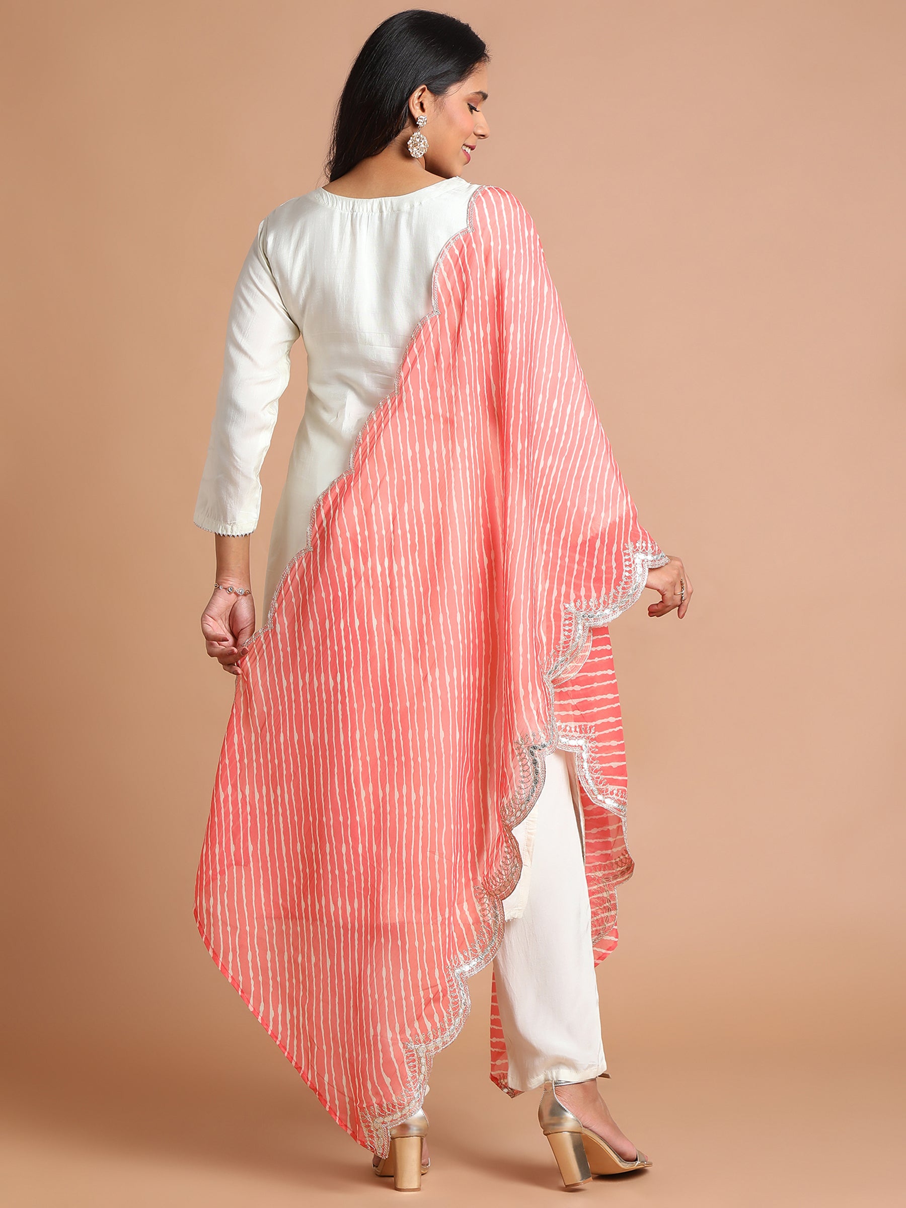 White floral kurta set with red tie dye scallop dupatta