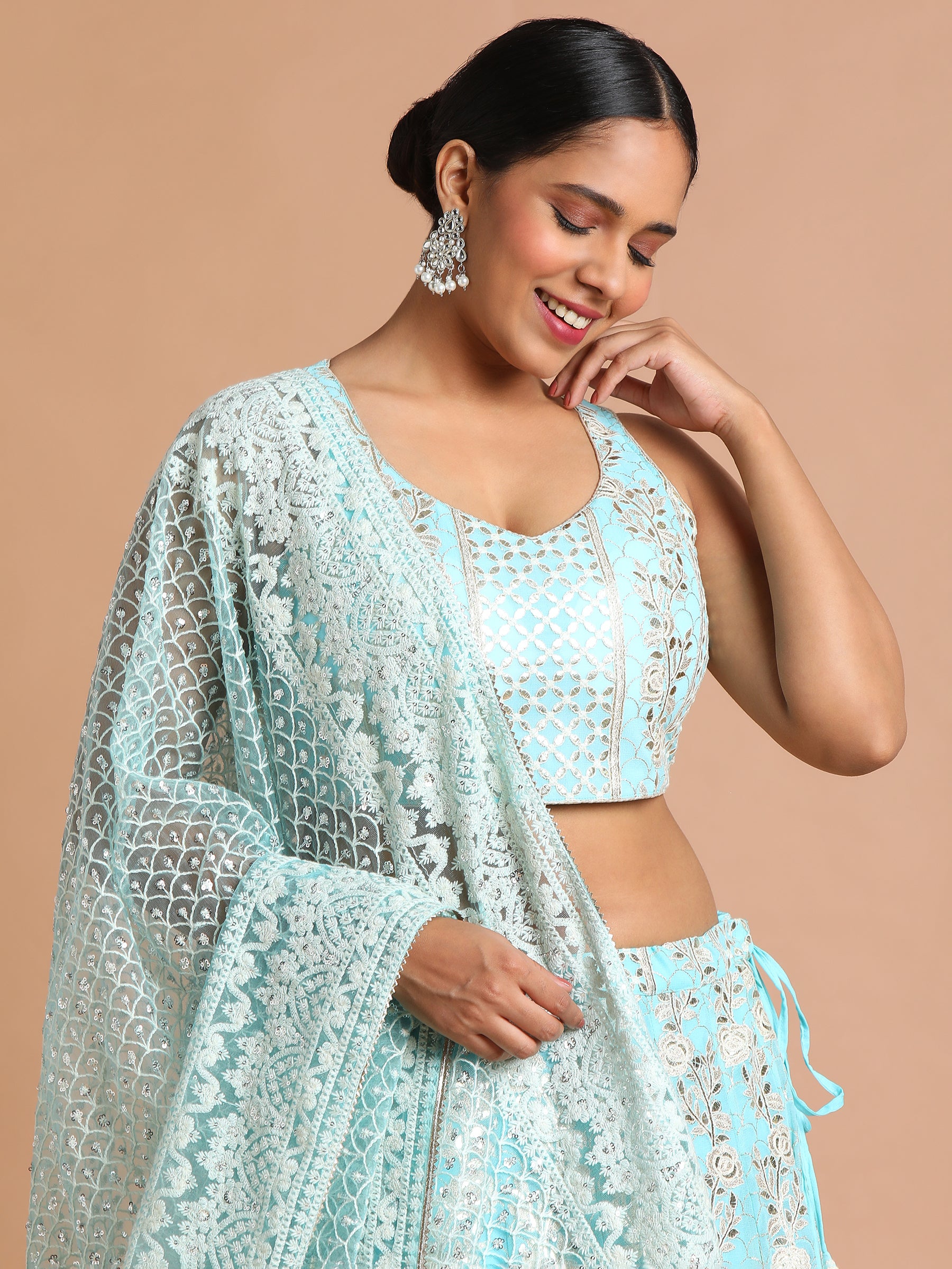 Turquoise blue silver paisely embroidered lehenga set