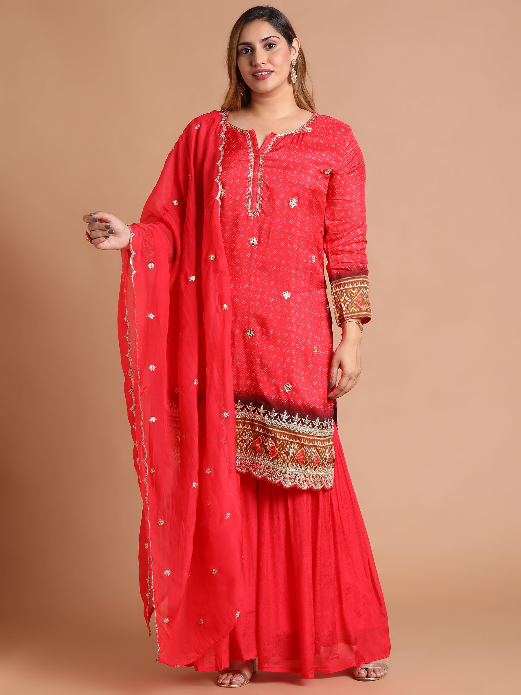 Red embroidered kurta and sharara set with patola print