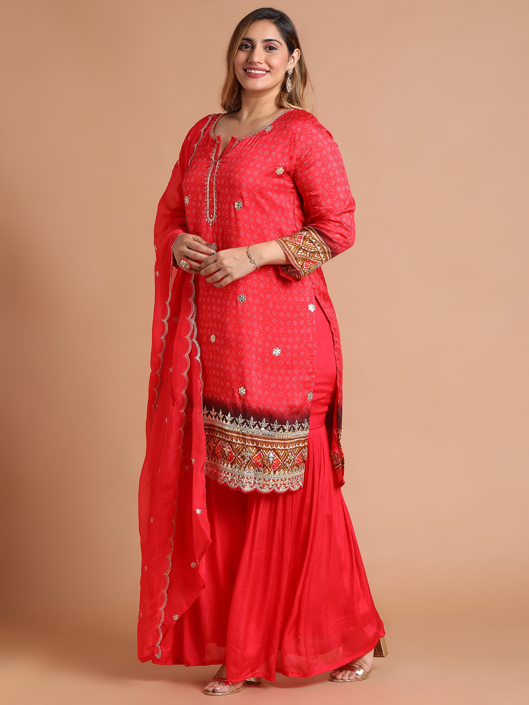 Red embroidered kurta and sharara set with patola print