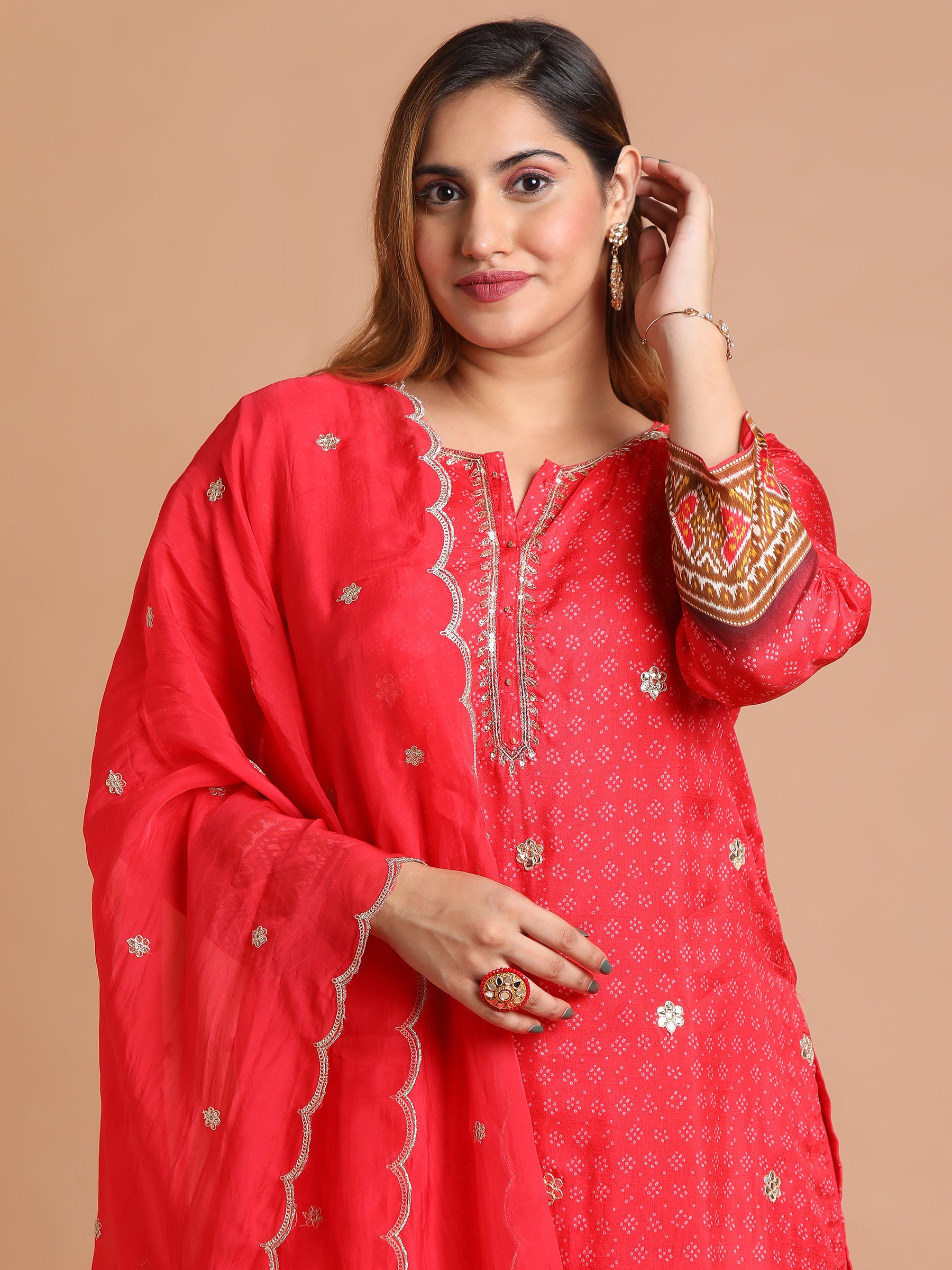 Red embroidered kurta and sharara set with patola print