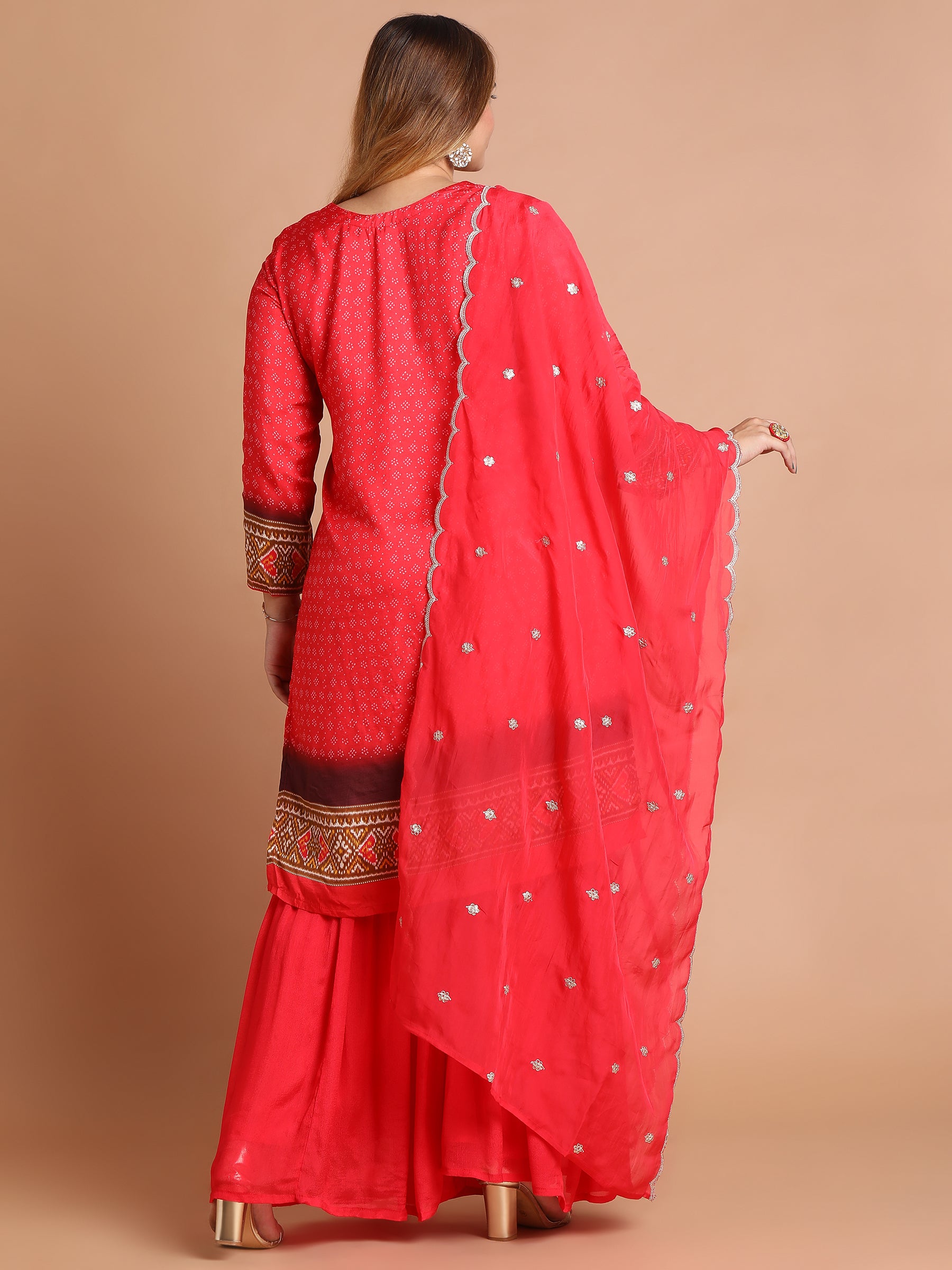 Red embroidered kurta and sharara set with patola print