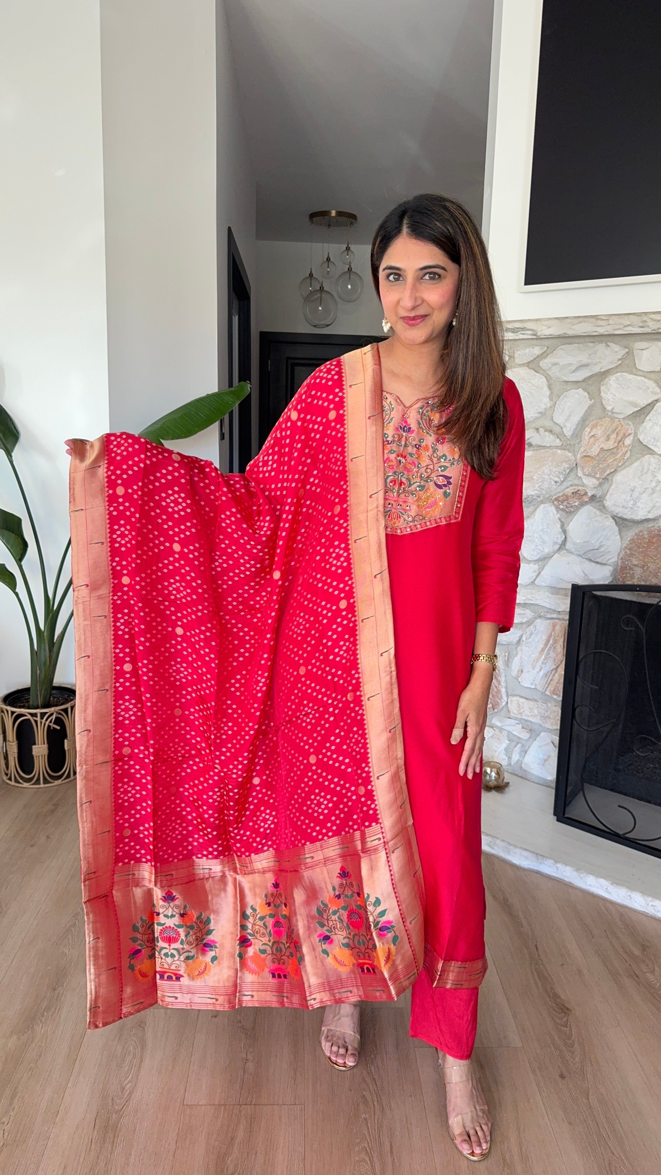 Red paithani silk kurta set with matching dupatta and potli bag