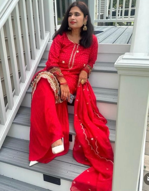 Red embroidered kurta and sharara set with patola print