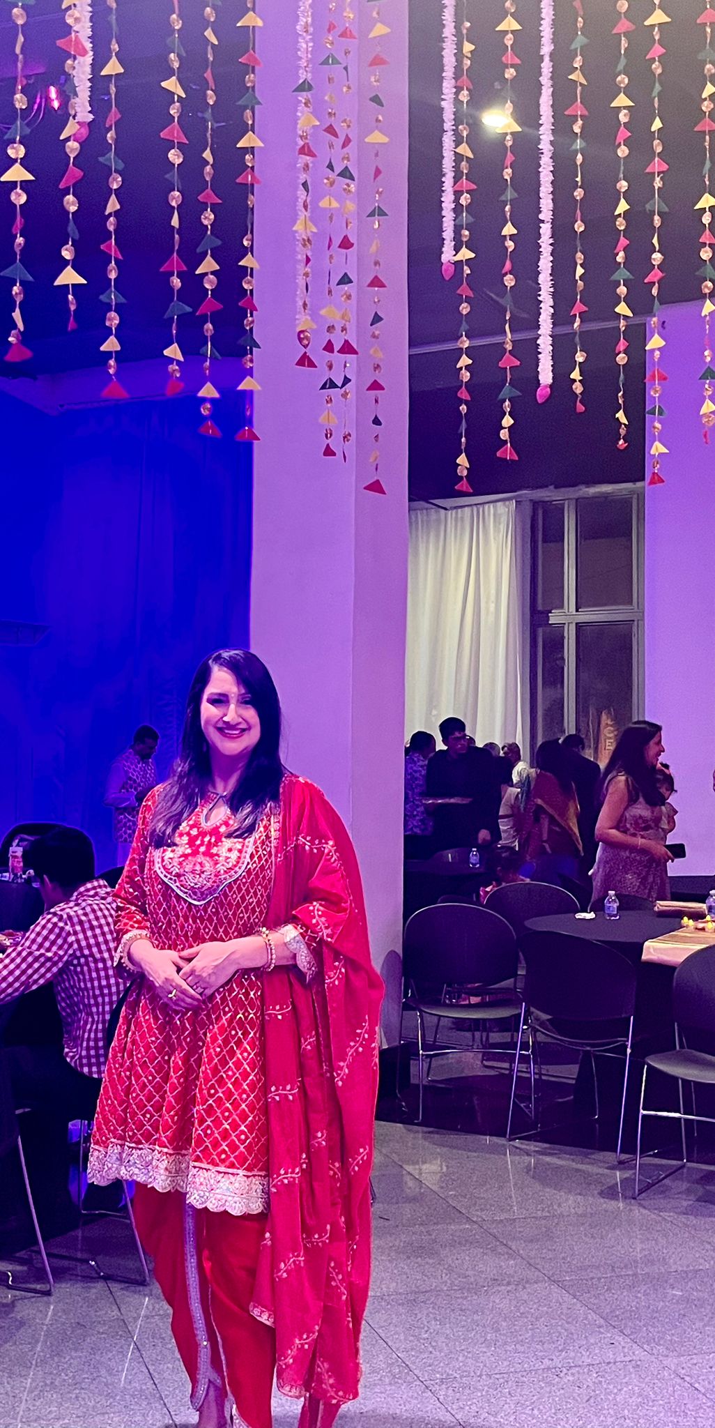 Red kurta and dhoti set with pink dupatta