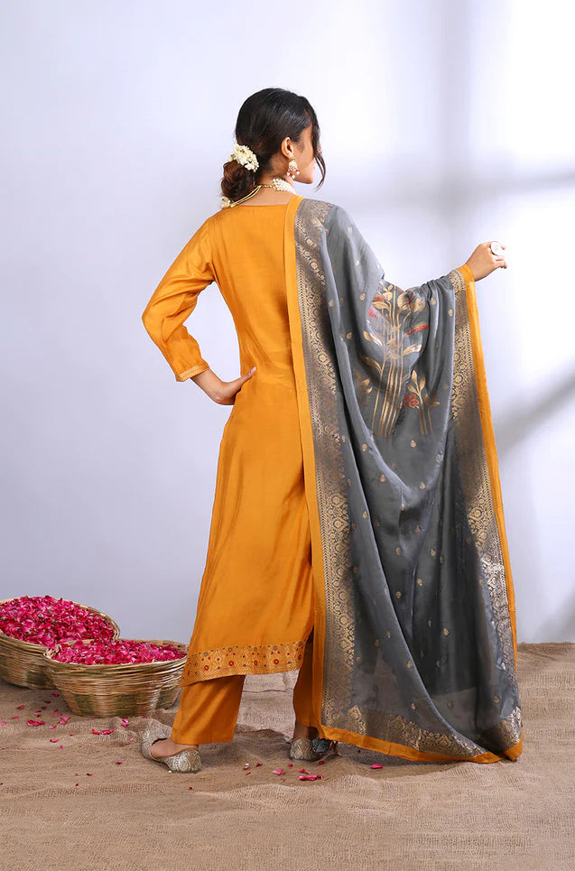 Dark mustard muslin jacquard kurta set with grey dupatta