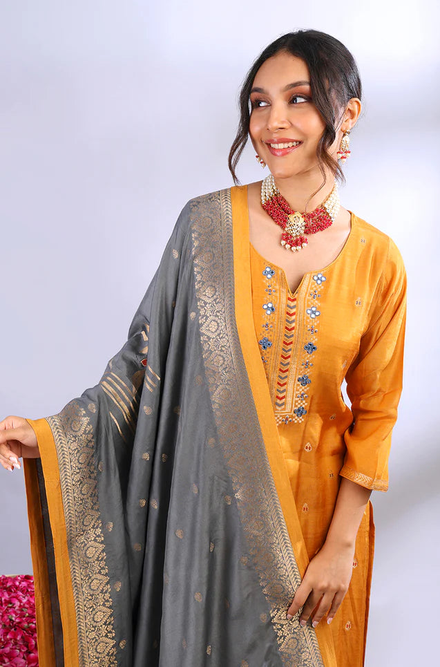 Dark mustard muslin jacquard kurta set with grey dupatta