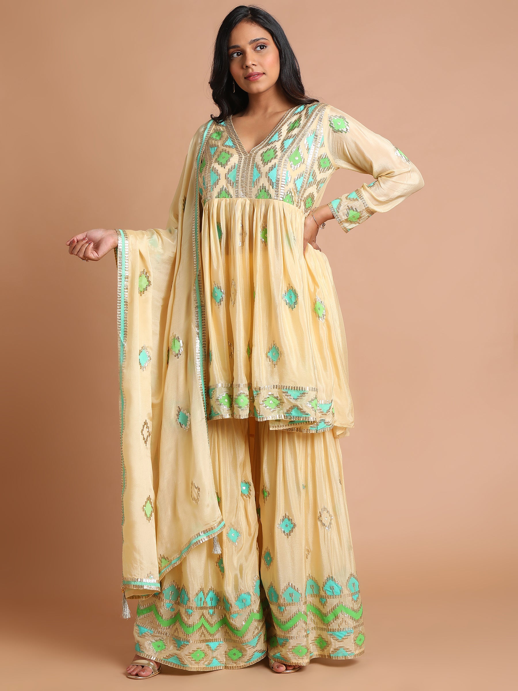 Light yellow patchwork peplum kurta and sharara set