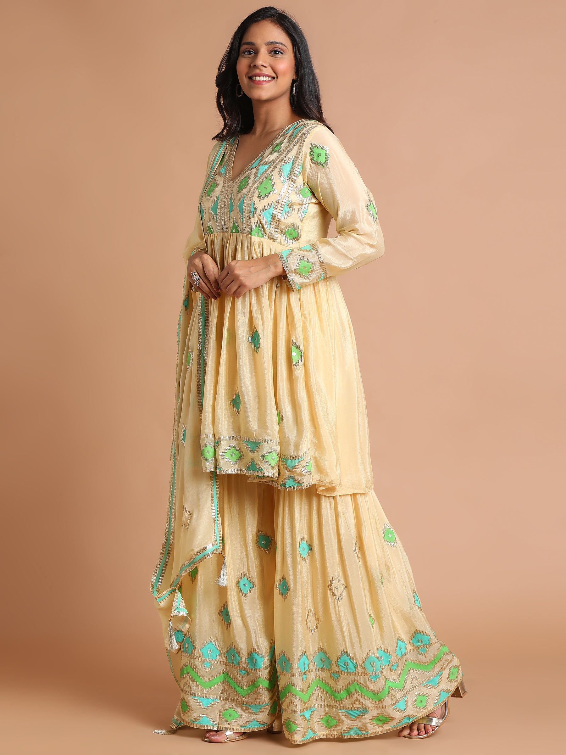 Light yellow patchwork peplum kurta and sharara set