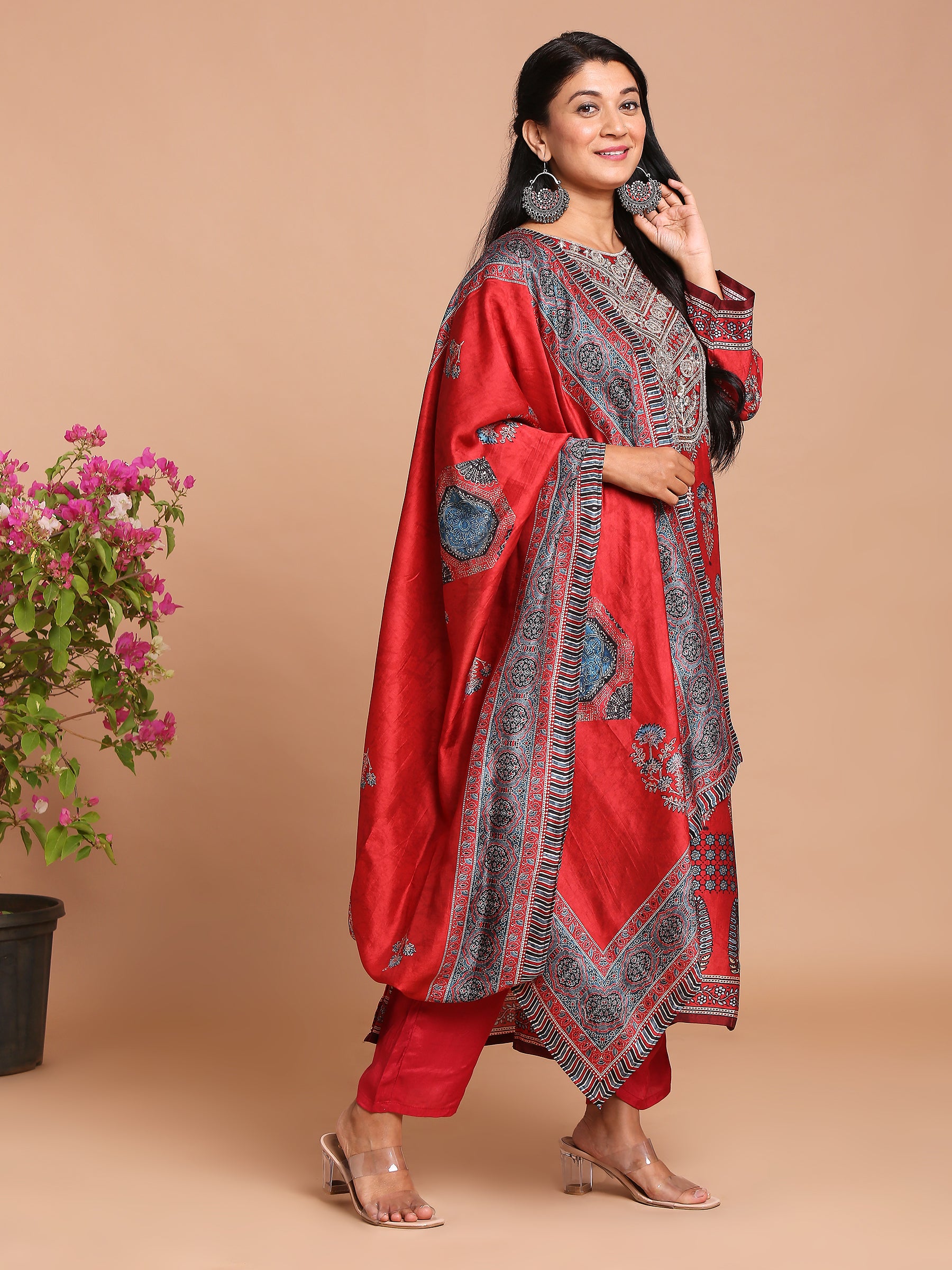 Bright red printed kurta with pants and dupatta