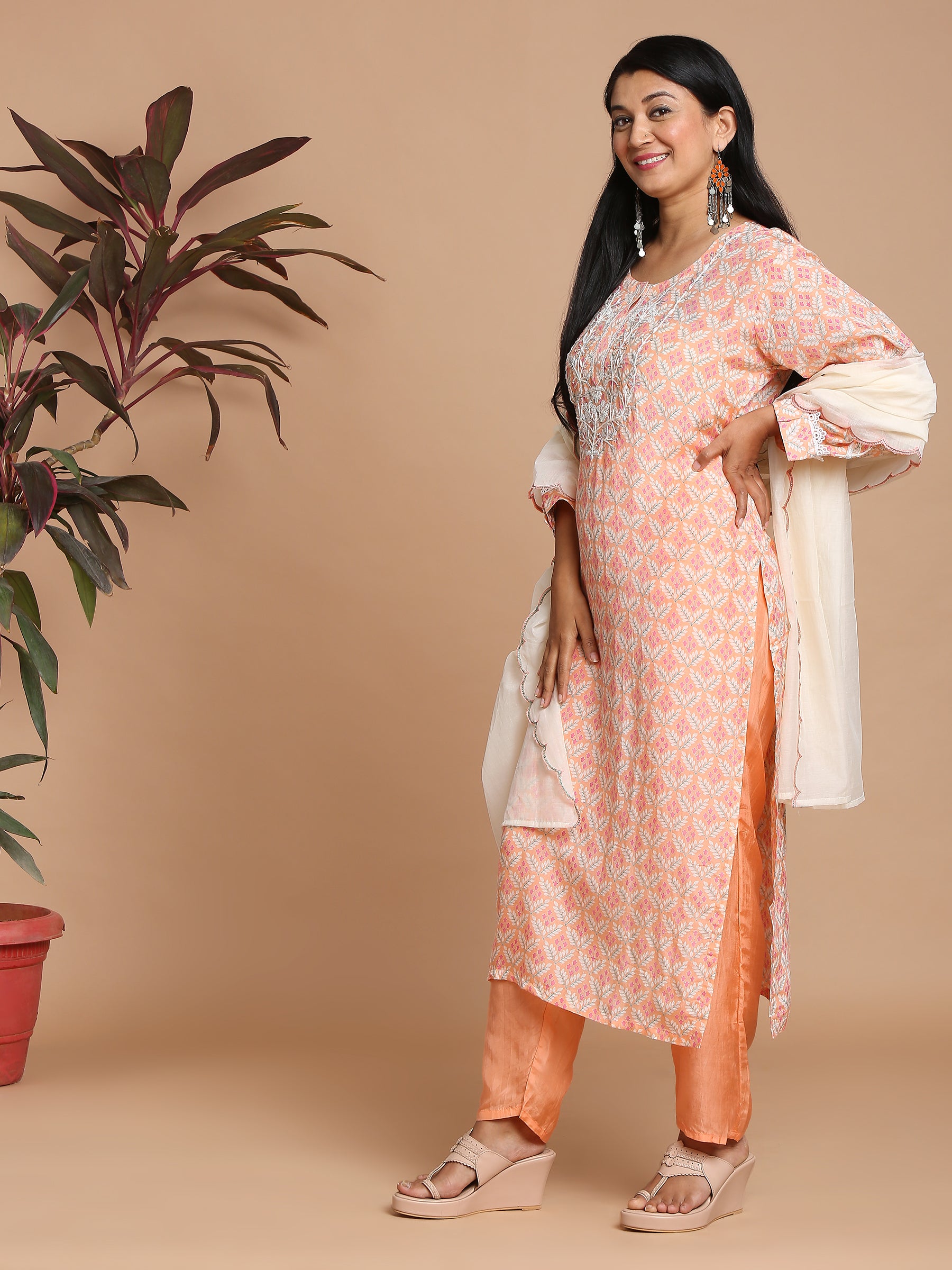 Peach floral printed kurta with pants and dupatta