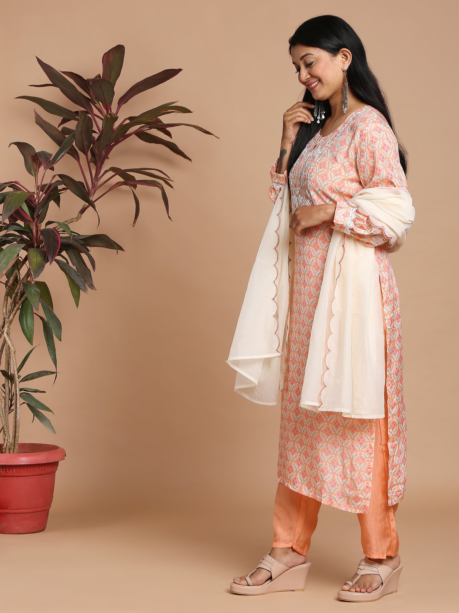 Peach floral printed kurta with pants and dupatta