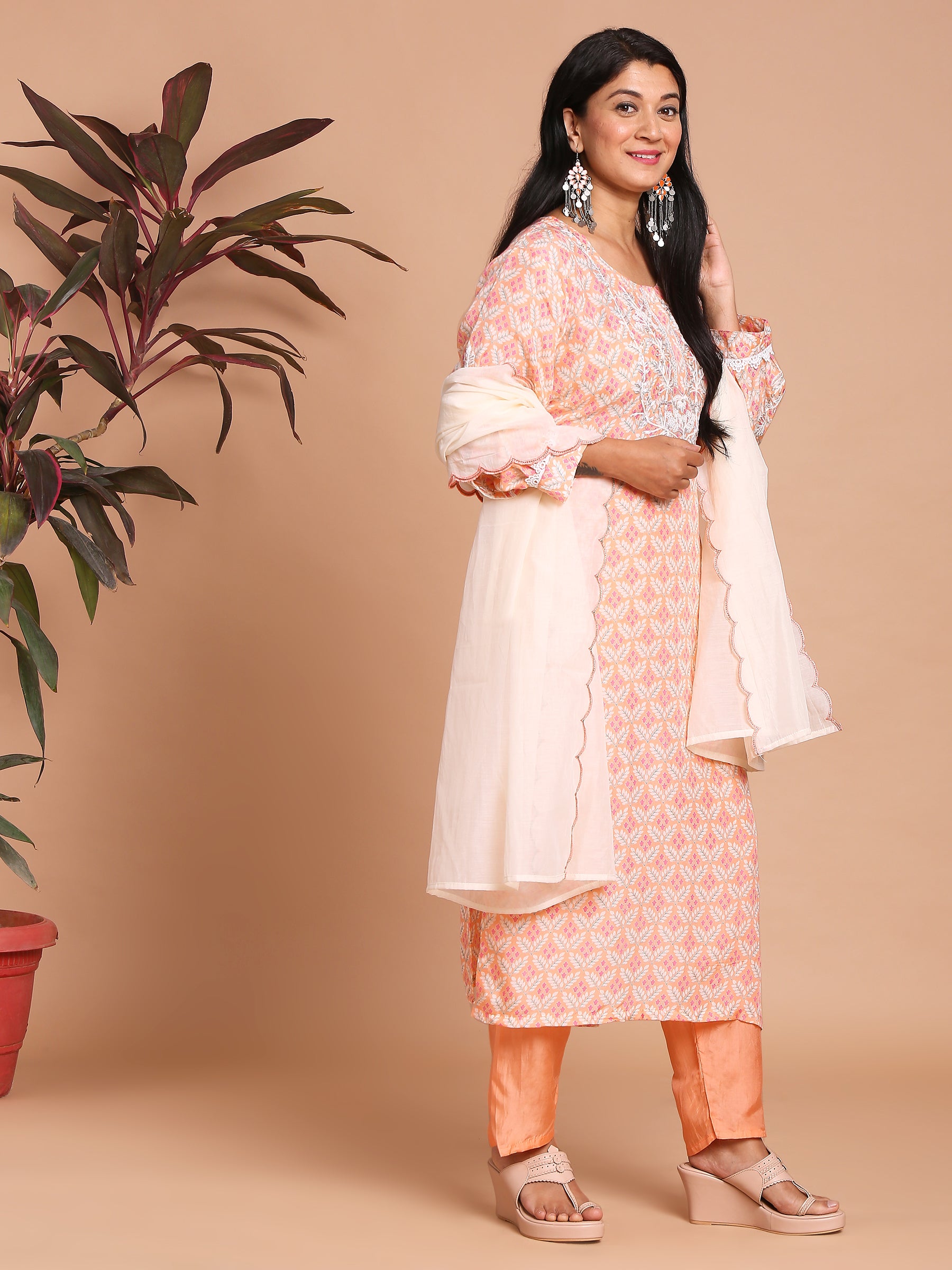 Peach floral printed kurta with pants and dupatta