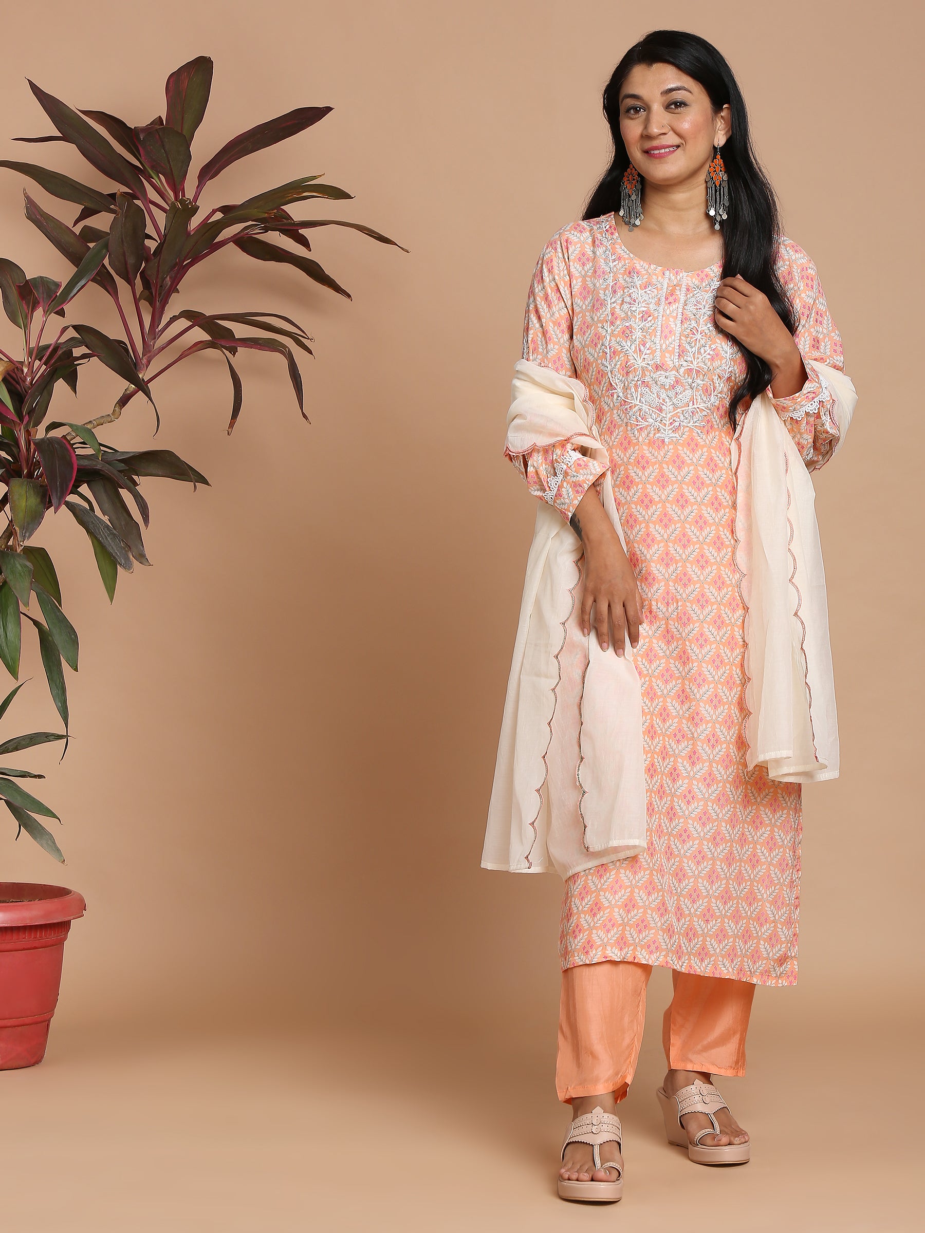 Peach floral printed kurta with pants and dupatta