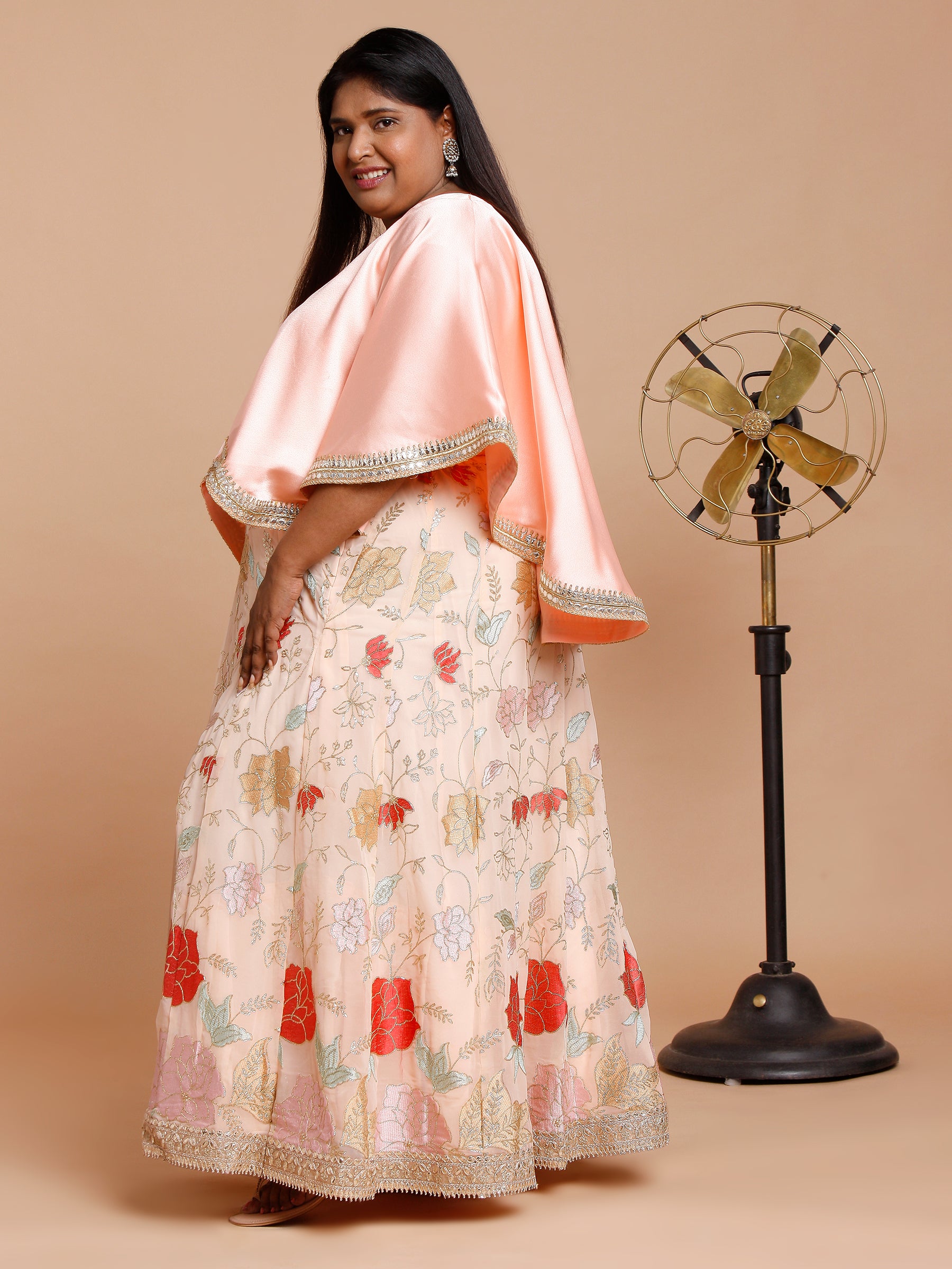 Peach cape with floral embroidered skirt