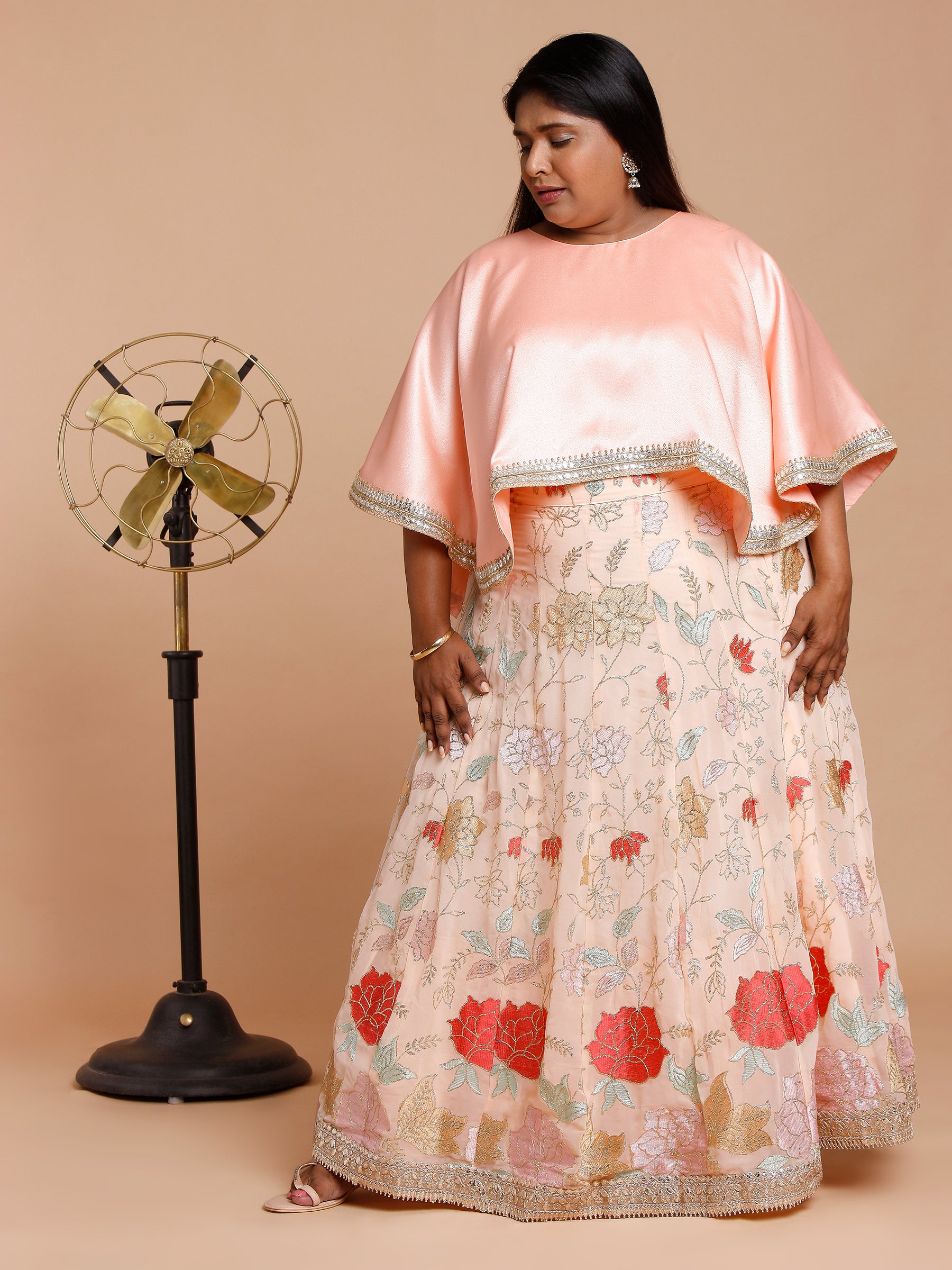 Peach cape with floral embroidered skirt